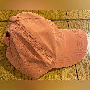 Calia by Carrie Underwood pony tail cap, adjustable, salmon color